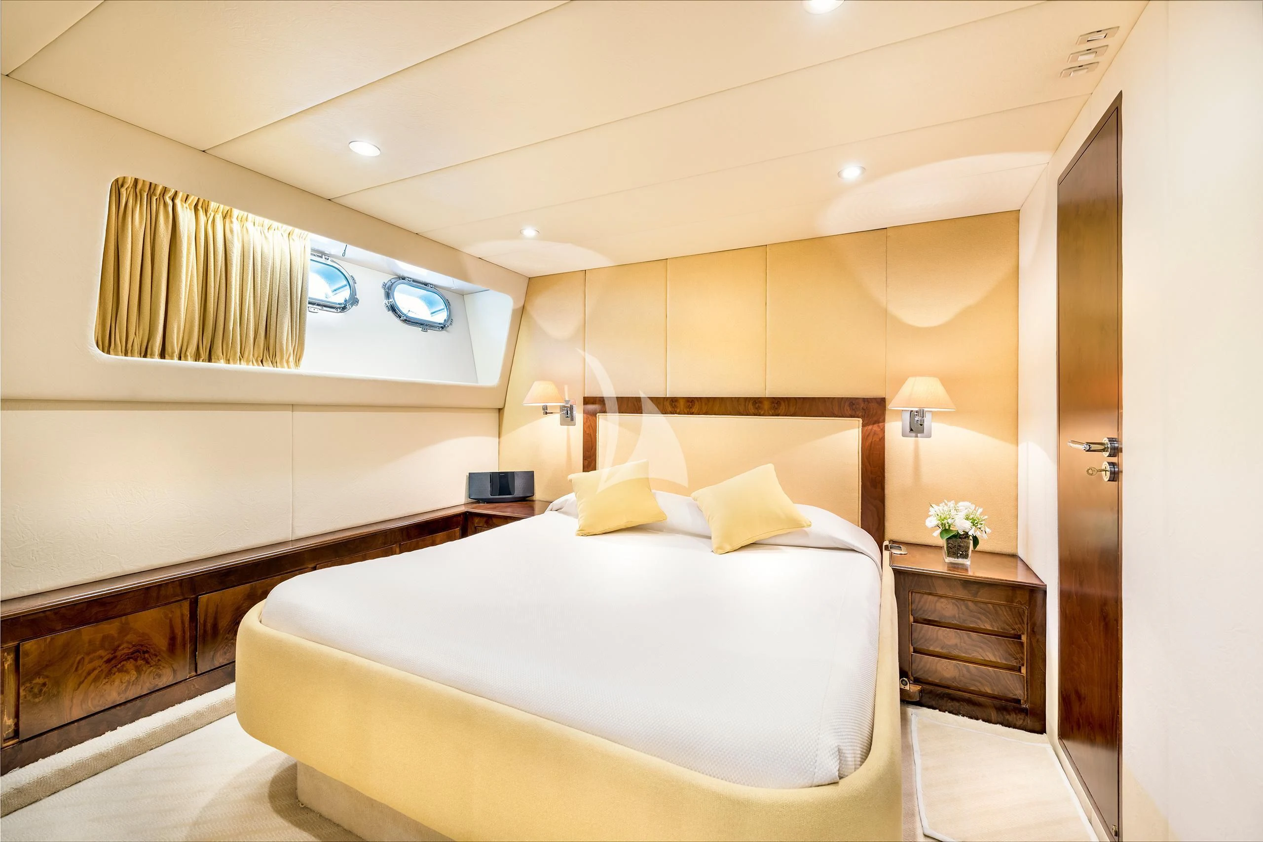 a large bedroom with a large bed aboard ANTISAN Yacht for Charter