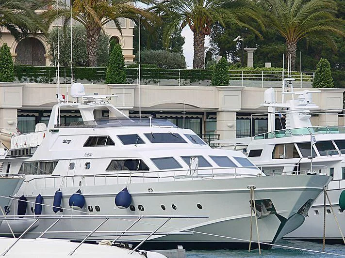 a white yacht in a tropical setting aboard ANTISAN Yacht for Charter