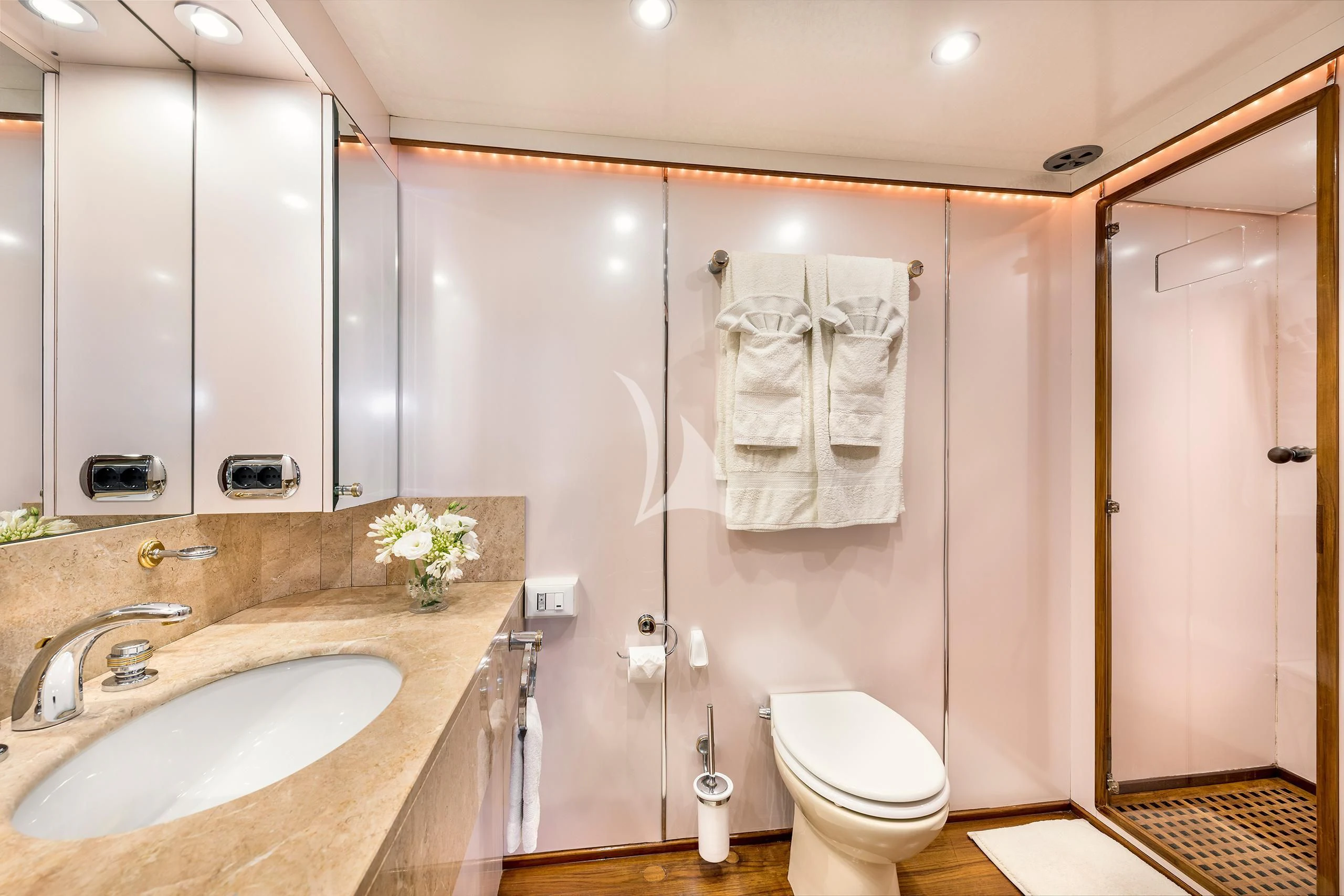 a bathroom with a sink toilet and shower aboard ANTISAN Yacht for Charter