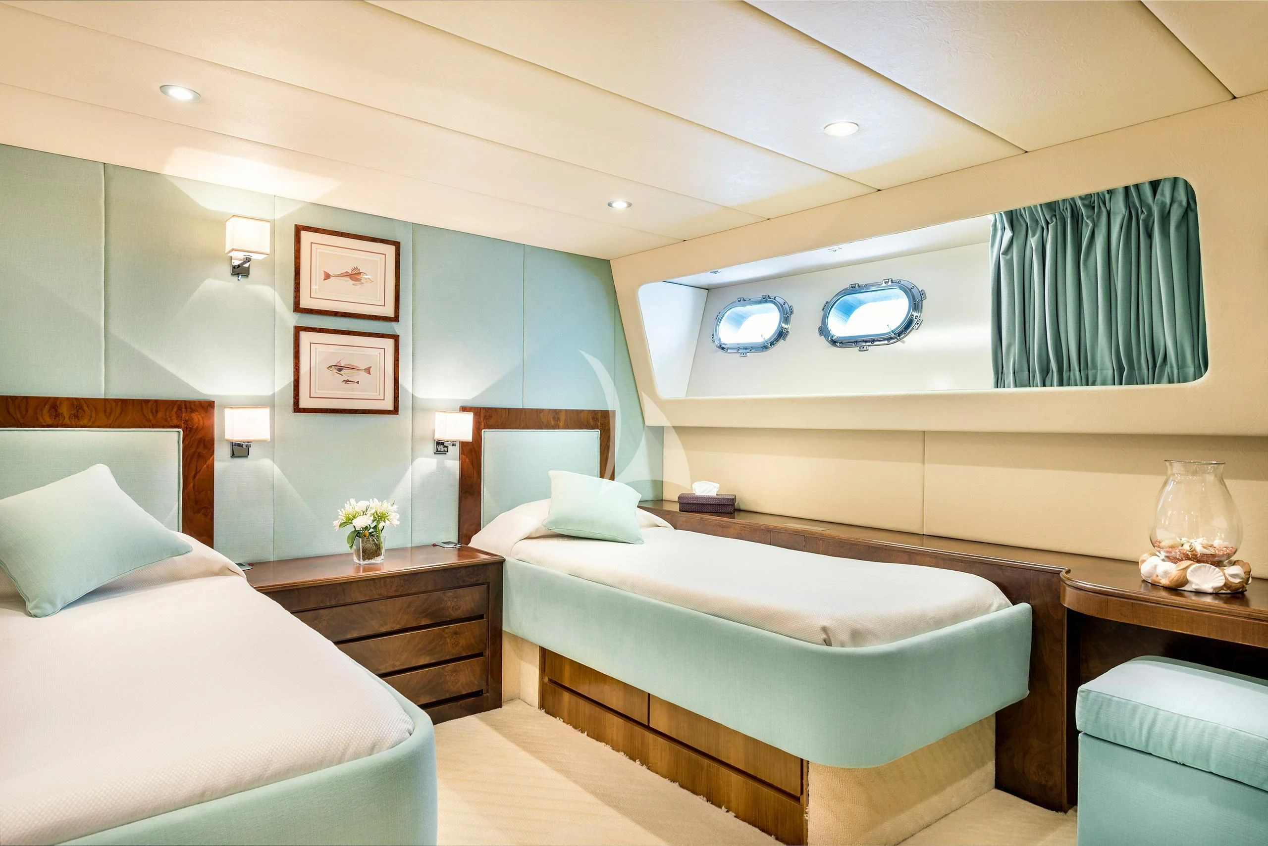 a room with two beds aboard ANTISAN Yacht for Charter