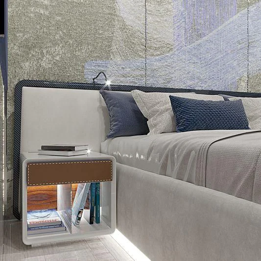 a bed with a laptop on it aboard ARIA SF Yacht for Sale