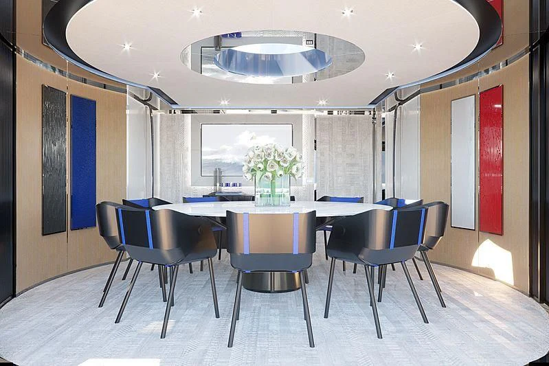 a room with a table and chairs aboard ARIA SF Yacht for Sale