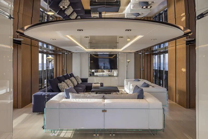 a room with a bed and a tv aboard ARIA SF Yacht for Sale