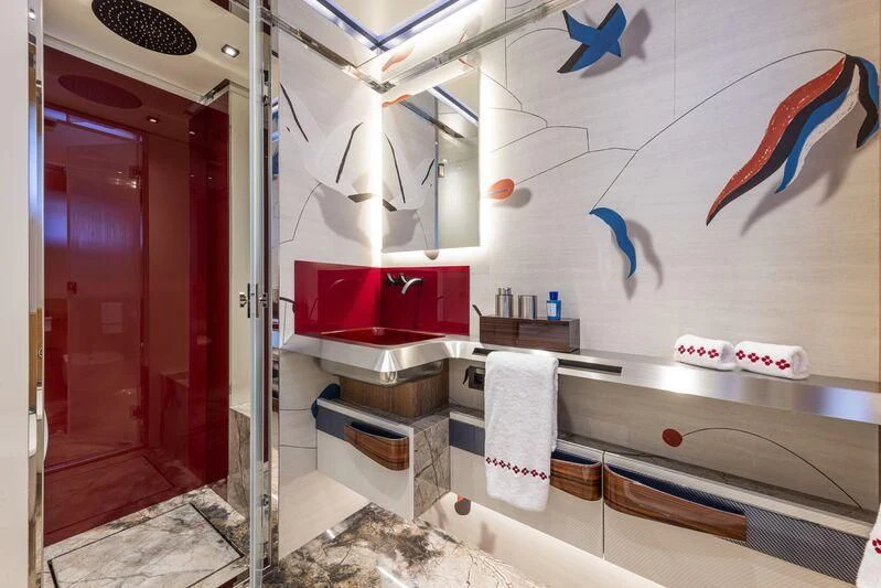 a bathroom with a sink and a mirror aboard ARIA SF Yacht for Sale