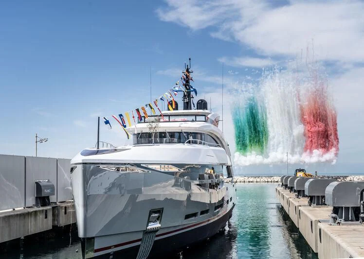 a large white boat with flags on it aboard ARIA SF Yacht for Sale