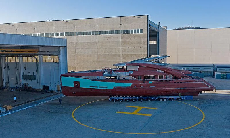 a large boat in front of a building aboard ARIA SF Yacht for Sale