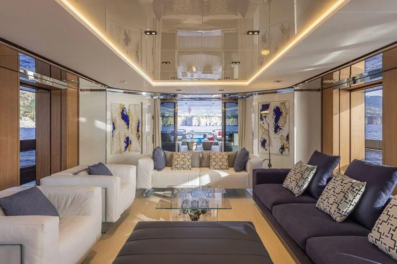 a living room with a large window aboard ARIA SF Yacht for Sale