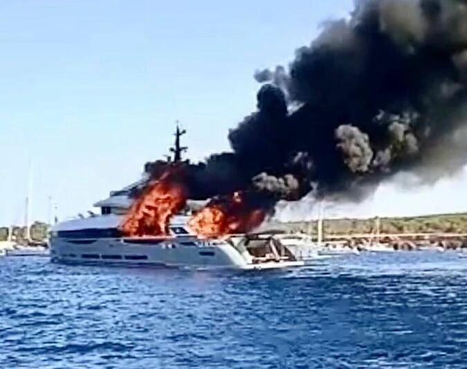 a boat with fire and smoke coming out of it aboard ARIA SF Yacht for Sale