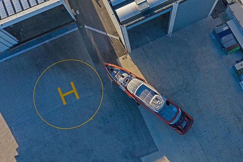 a car parked in a parking lot aboard ARIA SF Yacht for Sale
