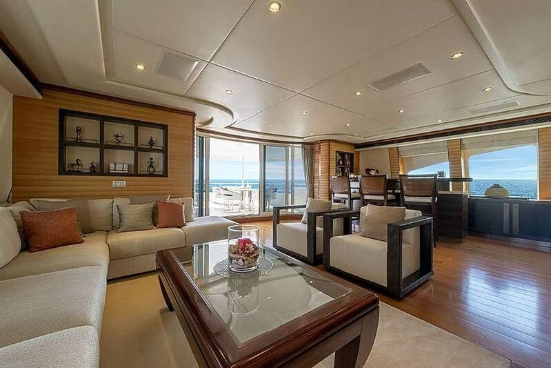 a living room with a large window aboard SPACE Y Yacht for Sale