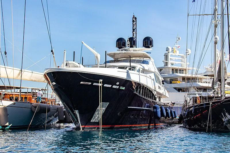 a large boat is parked in the water aboard SPACE Y Yacht for Sale