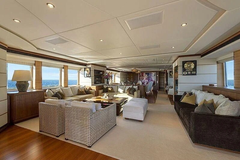 a living room with a couch and a table aboard SPACE Y Yacht for Sale