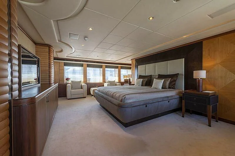 a bedroom with a large bed aboard SPACE Y Yacht for Sale