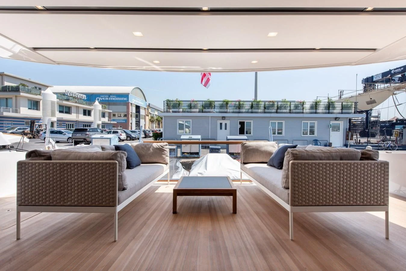 a large living room with a large balcony aboard VICKY Yacht for Sale