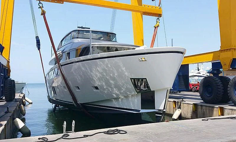 a boat docked at a dock aboard VICKY Yacht for Sale