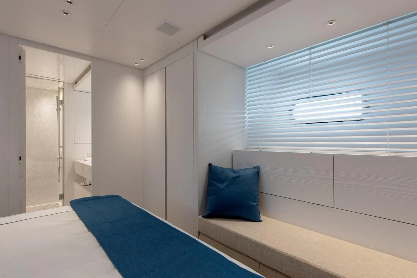 a room with a bed and a window aboard VICKY Yacht for Sale