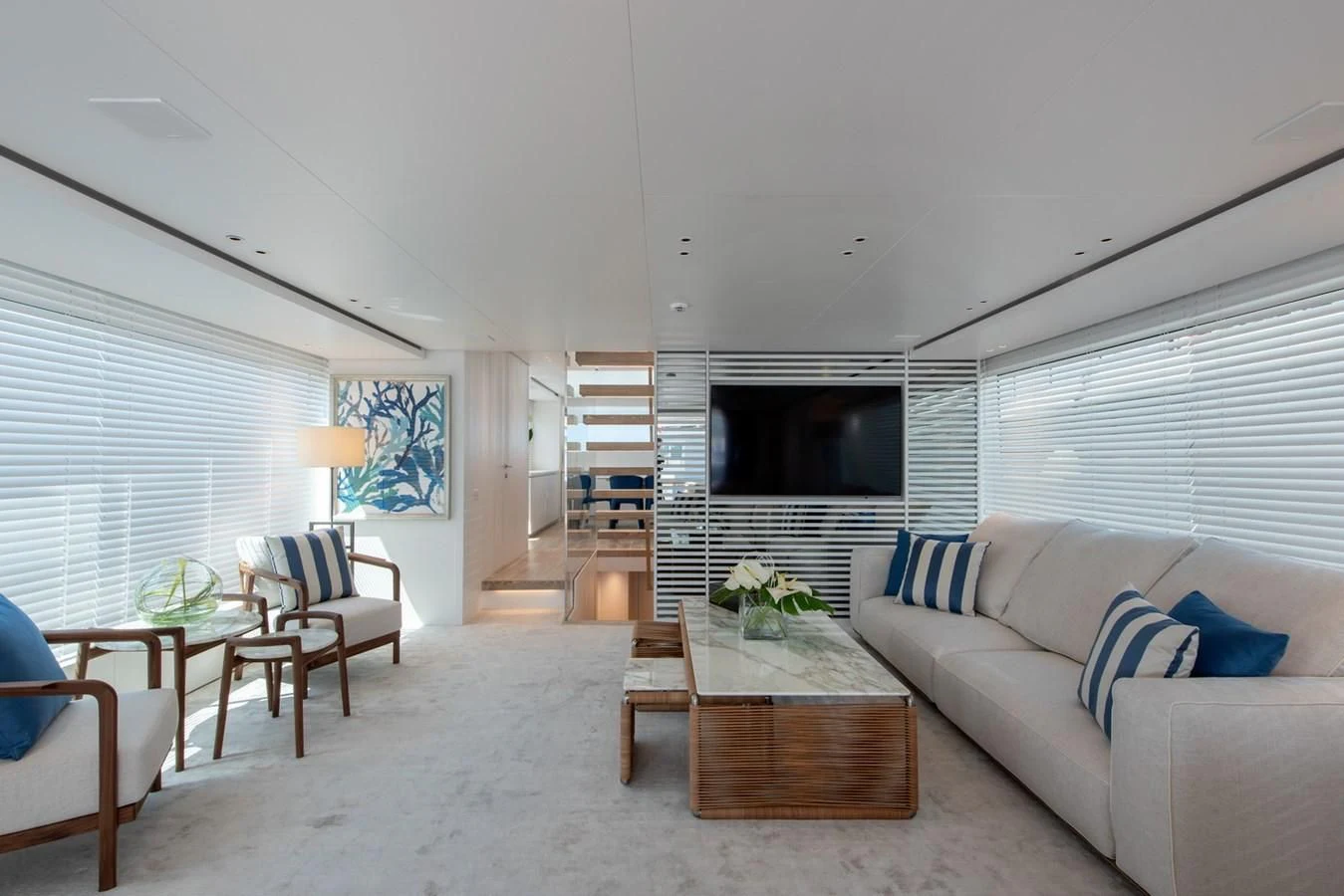 a living room with a fireplace aboard VICKY Yacht for Sale