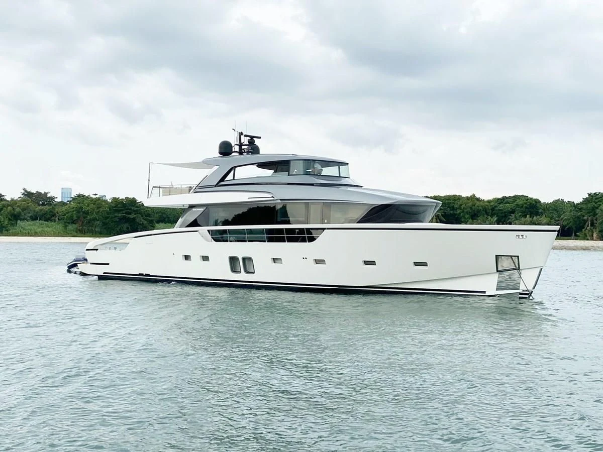 a white yacht on the water aboard VICKY Yacht for Sale