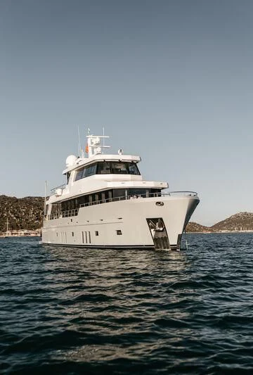 a large white boat in the water aboard LEMANJA Yacht for Sale