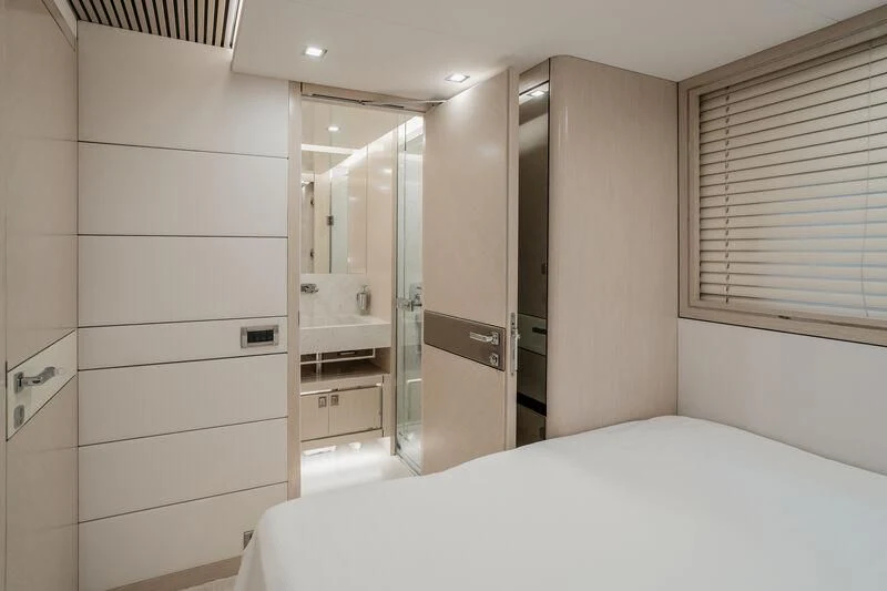 a large white bathroom with a large mirror aboard LEMANJA Yacht for Sale