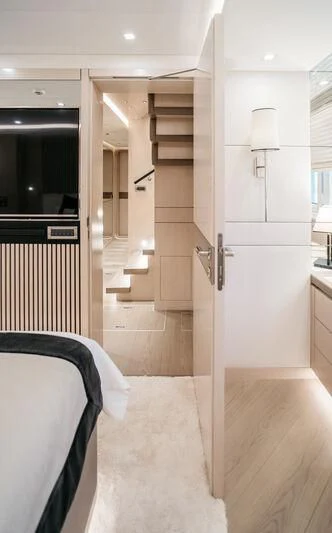 a room with a bed and a closet aboard LEMANJA Yacht for Sale