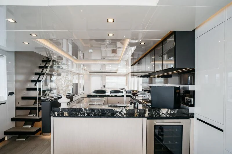 a kitchen with a large oven and a large island aboard LEMANJA Yacht for Sale