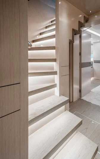a wooden staircase in a room aboard LEMANJA Yacht for Sale