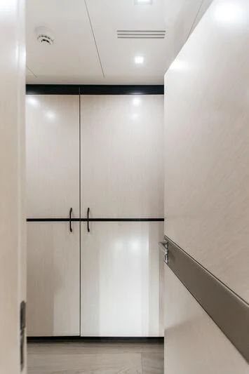a white cabinet in a room aboard LEMANJA Yacht for Sale