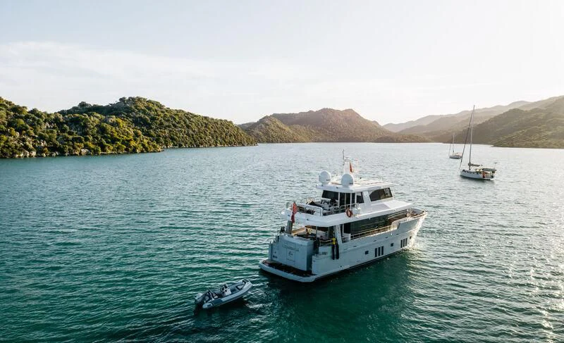 a couple of boats in the water aboard LEMANJA Yacht for Sale
