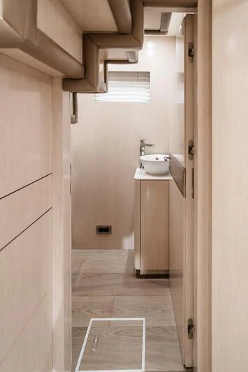 a bathroom with a sink and a mirror aboard LEMANJA Yacht for Sale