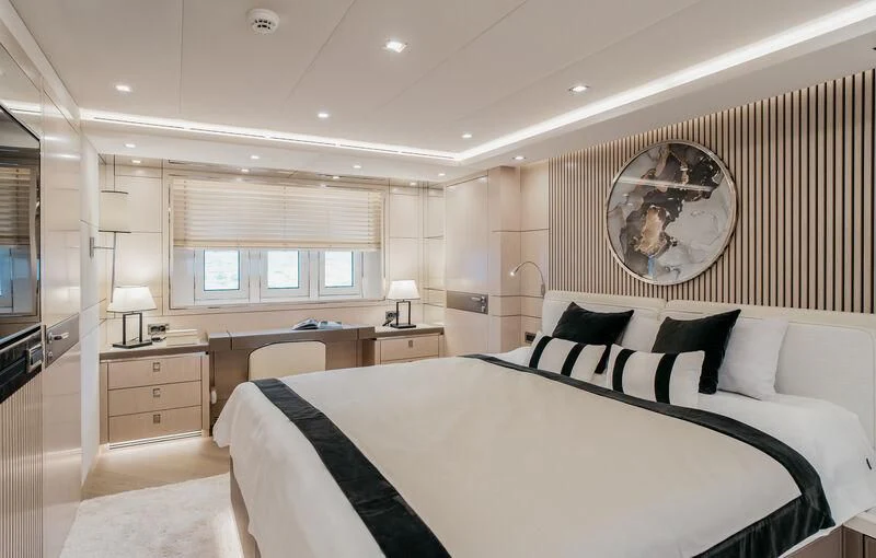 a large bedroom with a large bed aboard LEMANJA Yacht for Sale