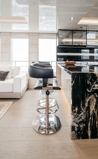 a modern looking living room aboard LEMANJA Yacht for Sale