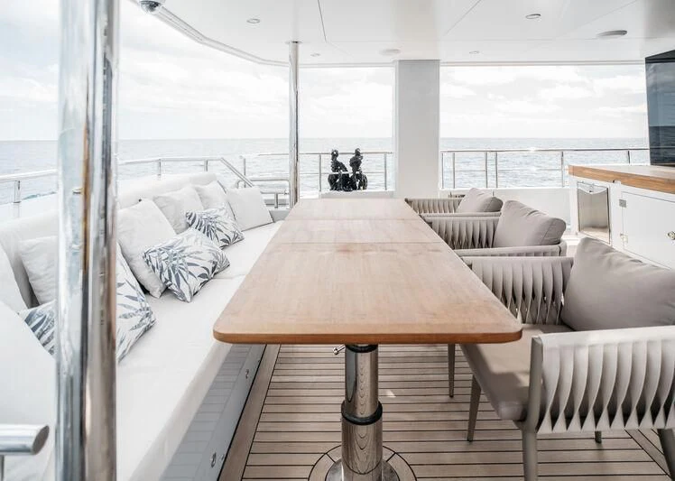 a living room with a large window aboard LEMANJA Yacht for Sale