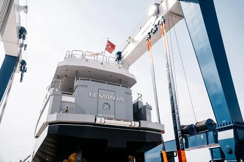 a large white boat with a blue stripe aboard LEMANJA Yacht for Sale