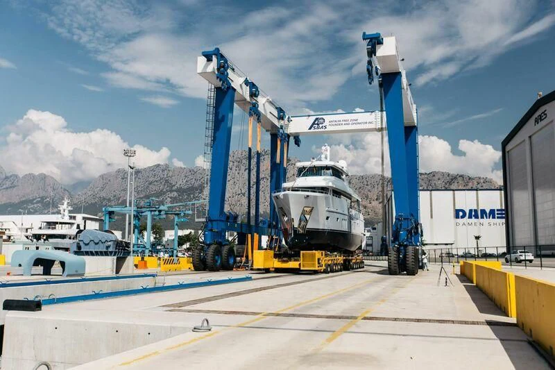 a large crane on a dock aboard LEMANJA Yacht for Sale