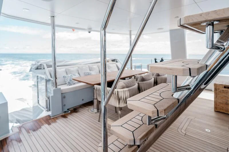 a deck with a view of the ocean and a deck aboard LEMANJA Yacht for Sale