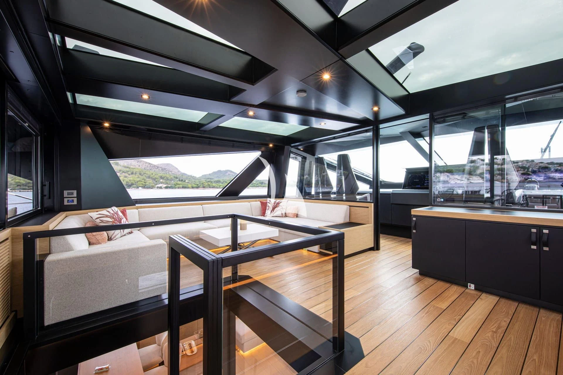 a room with a table and chairs aboard WHY 200 Yacht for Sale