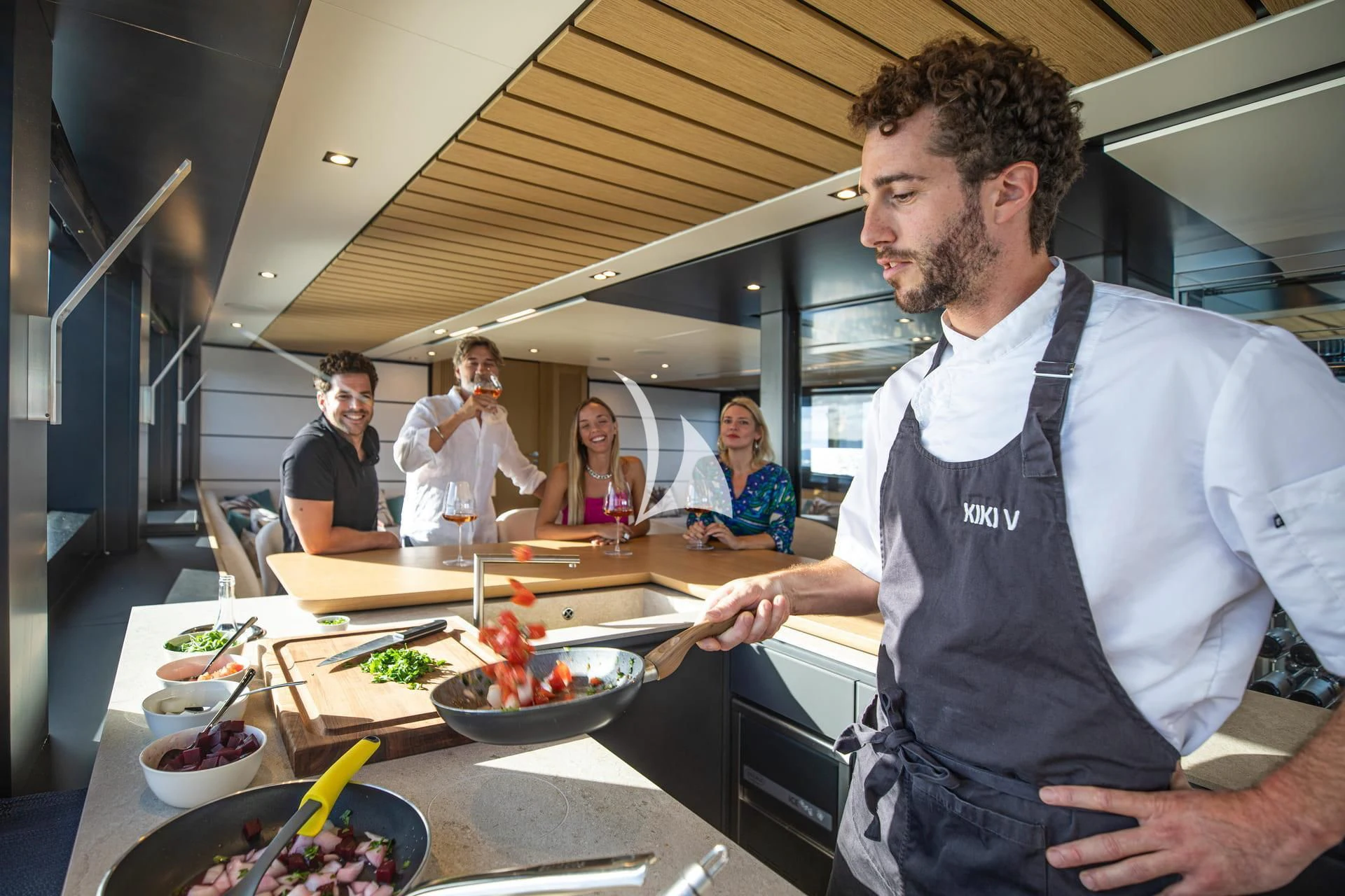 a man in a kitchen aboard WHY 200 Yacht for Sale