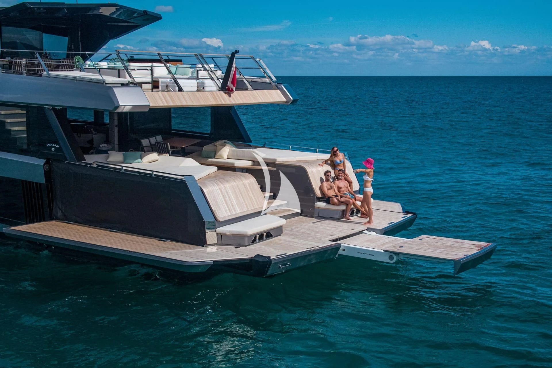 a group of people on a boat aboard WHY 200 Yacht for Sale