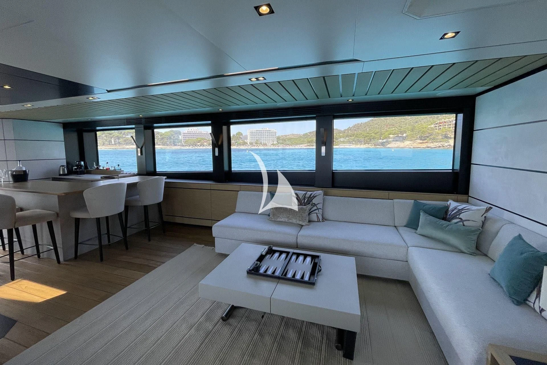 a living room with a large window aboard WHY 200 Yacht for Sale