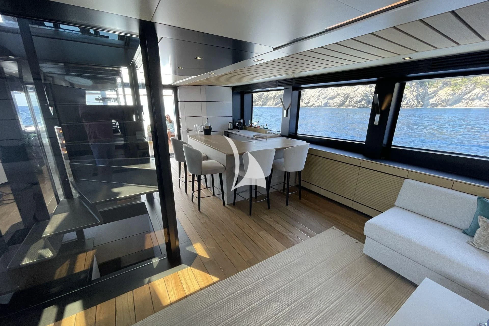 a room with a table and chairs aboard WHY 200 Yacht for Sale