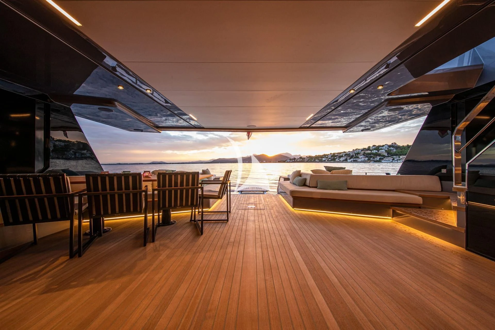 a deck with a view of the ocean and the beach aboard WHY 200 Yacht for Sale