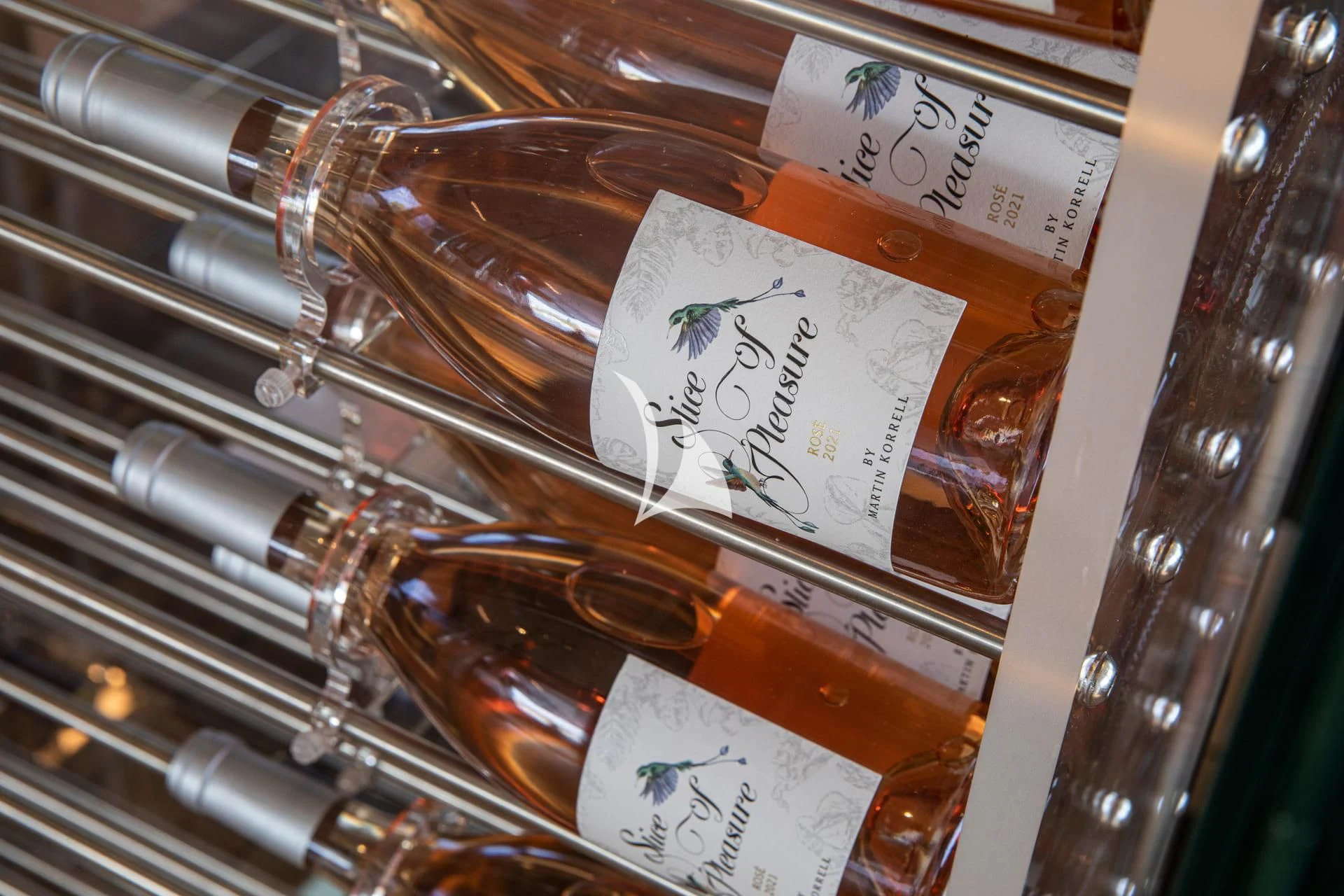 a glass case with a glass case full of brown liquid and a note aboard WHY 200 Yacht for Sale