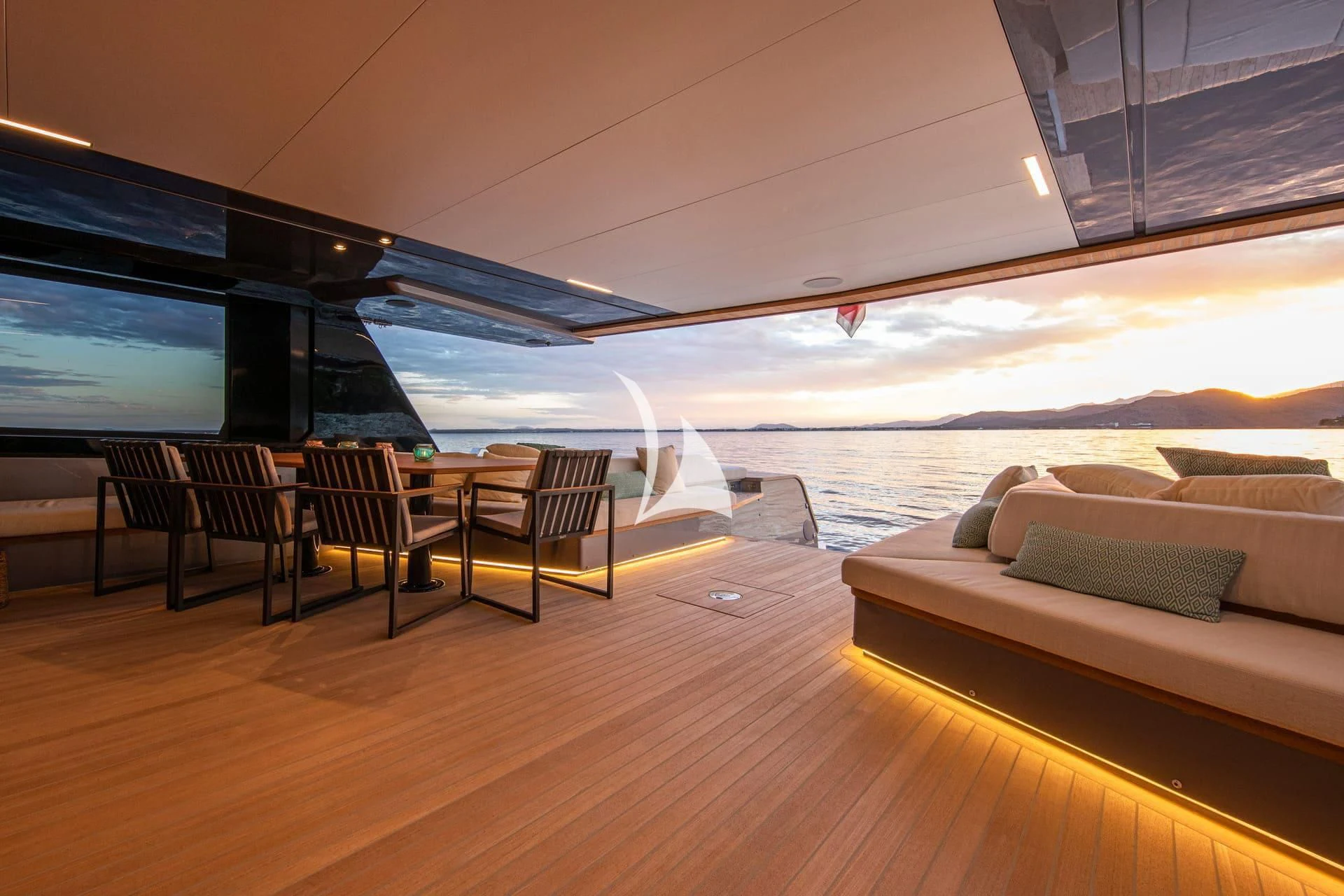 a room with a couch and a table and chairs aboard WHY 200 Yacht for Sale