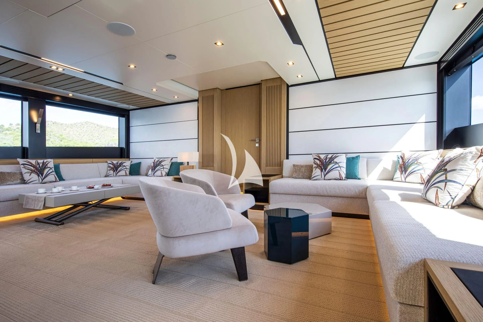a living room with a large window aboard WHY 200 Yacht for Sale
