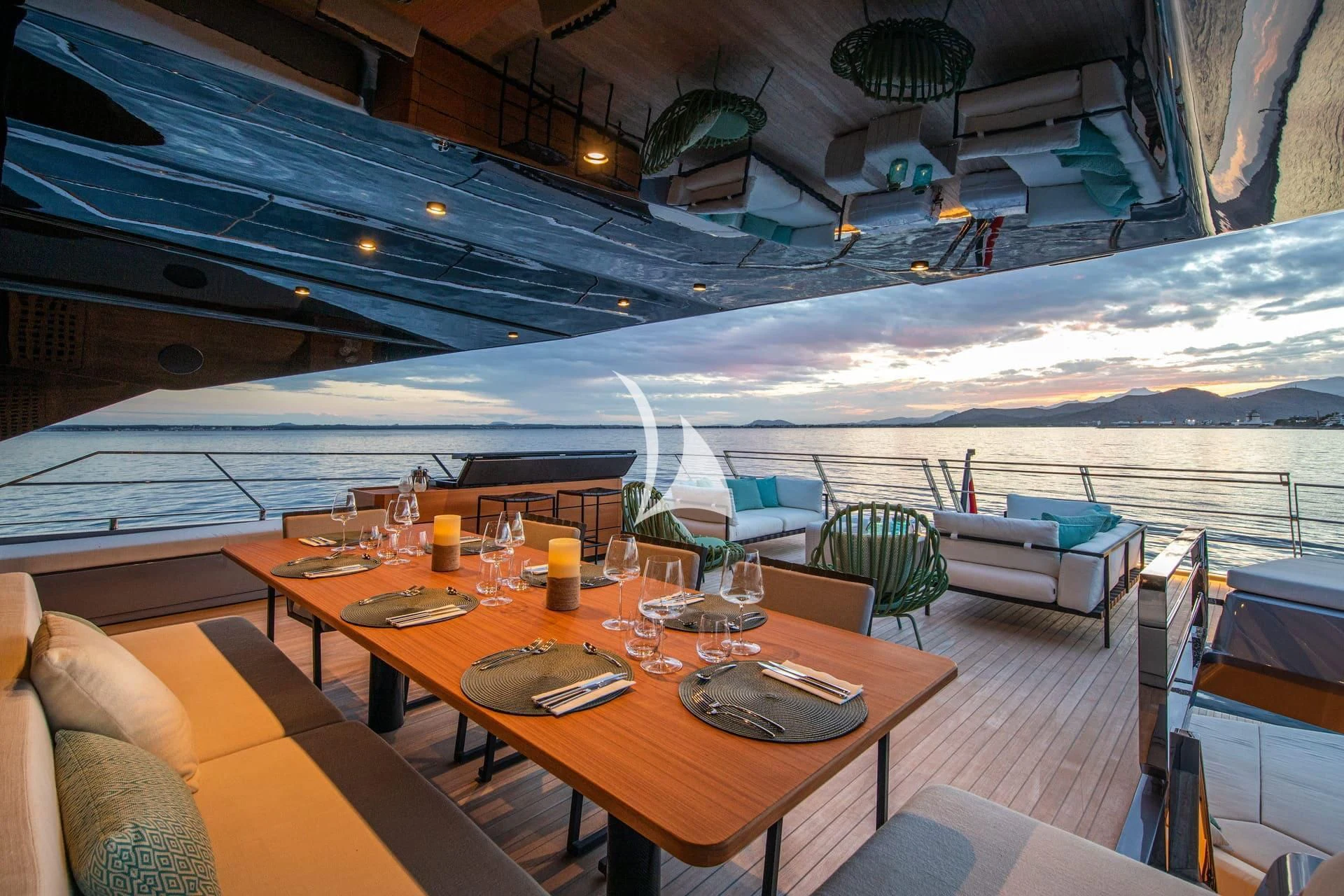 a room with a table and chairs aboard WHY 200 Yacht for Sale