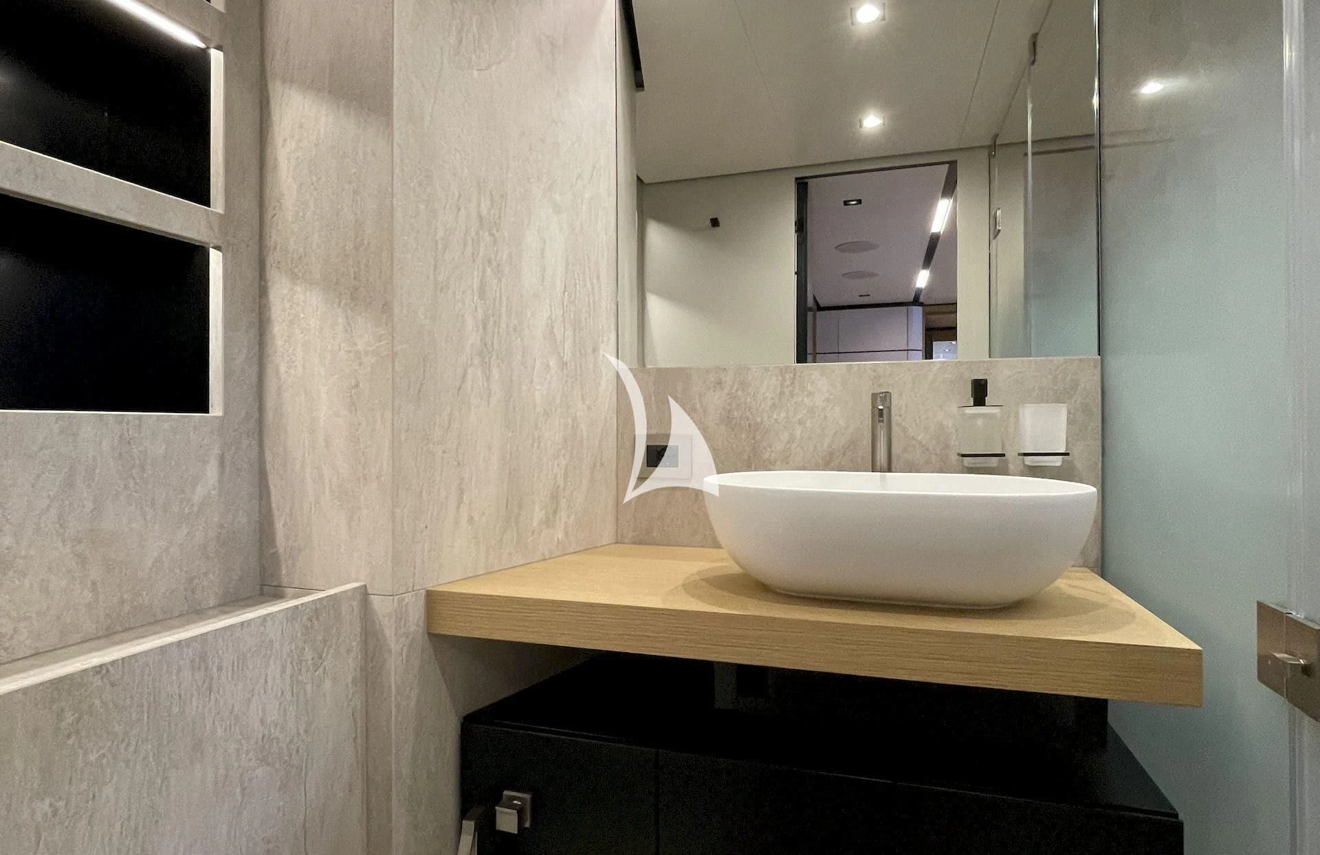 a bathroom with a sink and mirror aboard WHY 200 Yacht for Sale