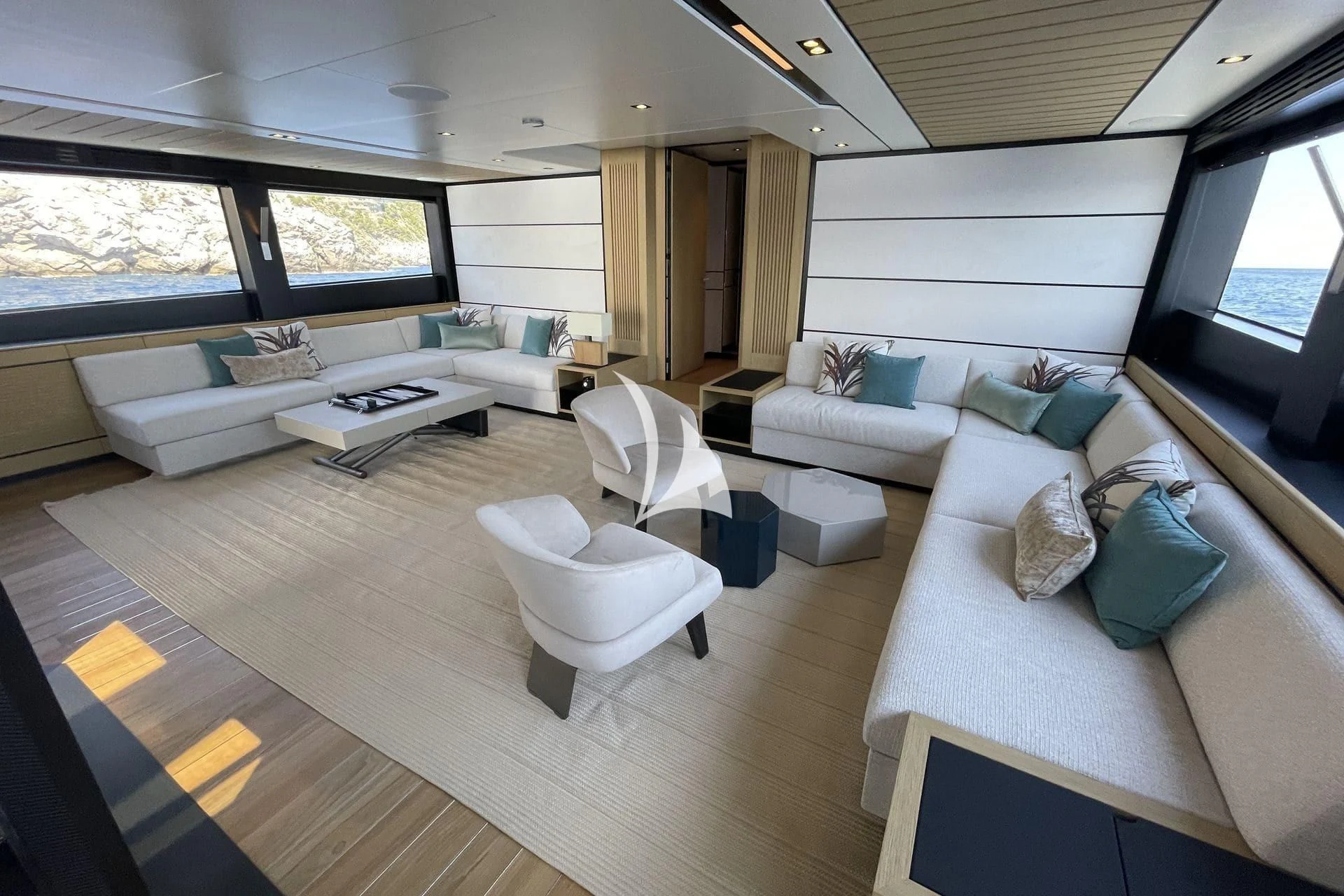 a living room with a large window aboard WHY 200 Yacht for Sale