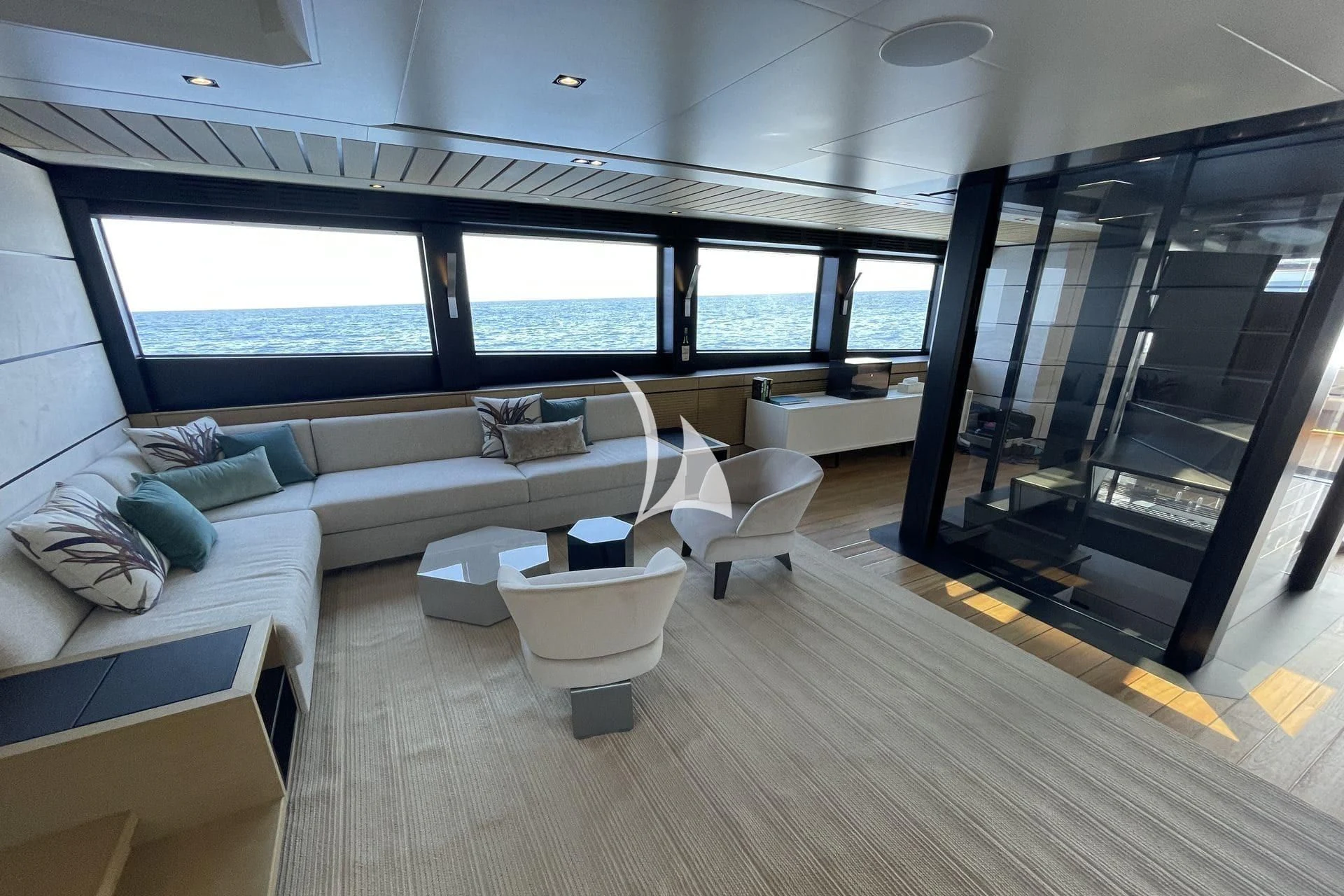a room with a couch and a large window aboard WHY 200 Yacht for Sale