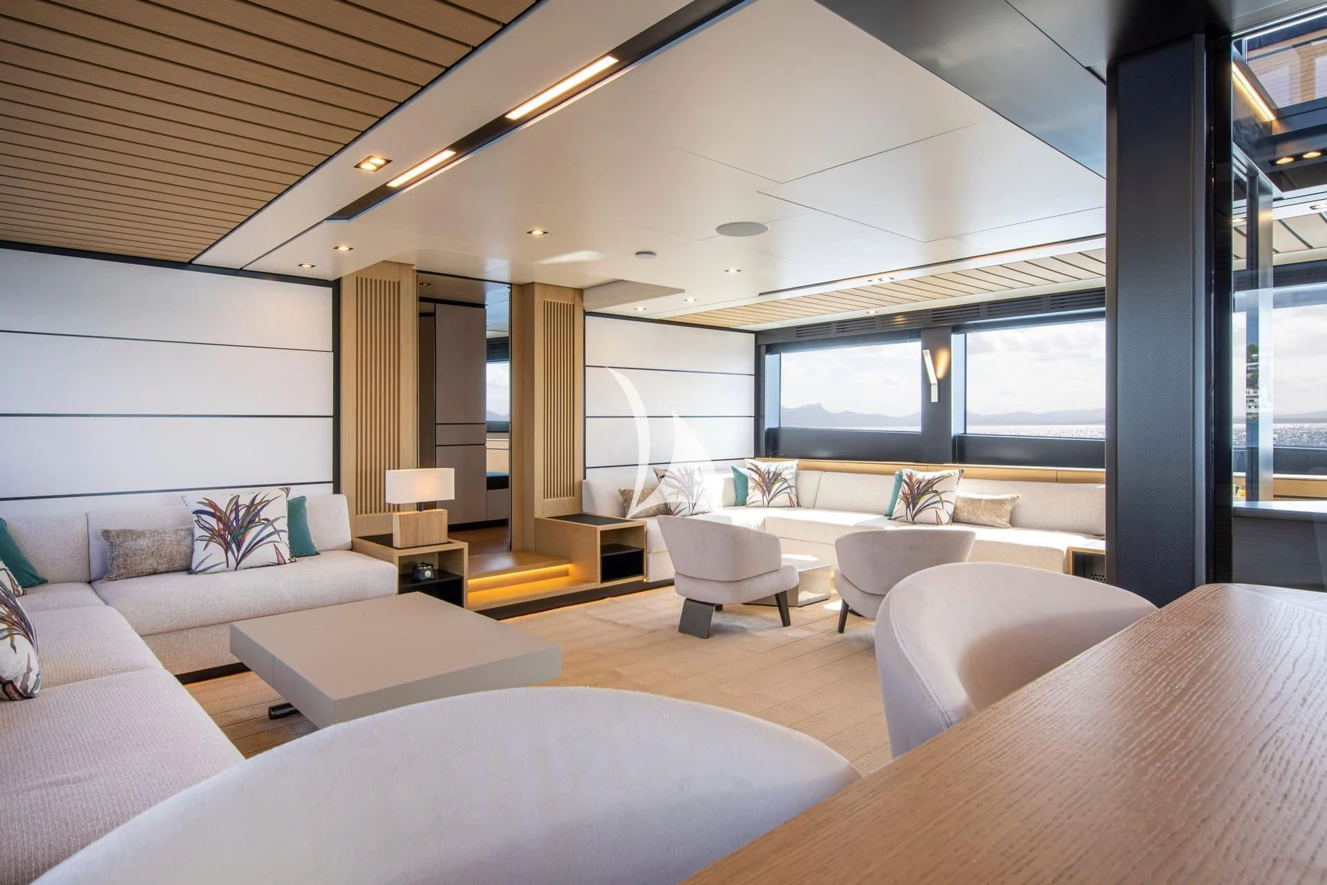 a living room with a large window aboard WHY 200 Yacht for Sale